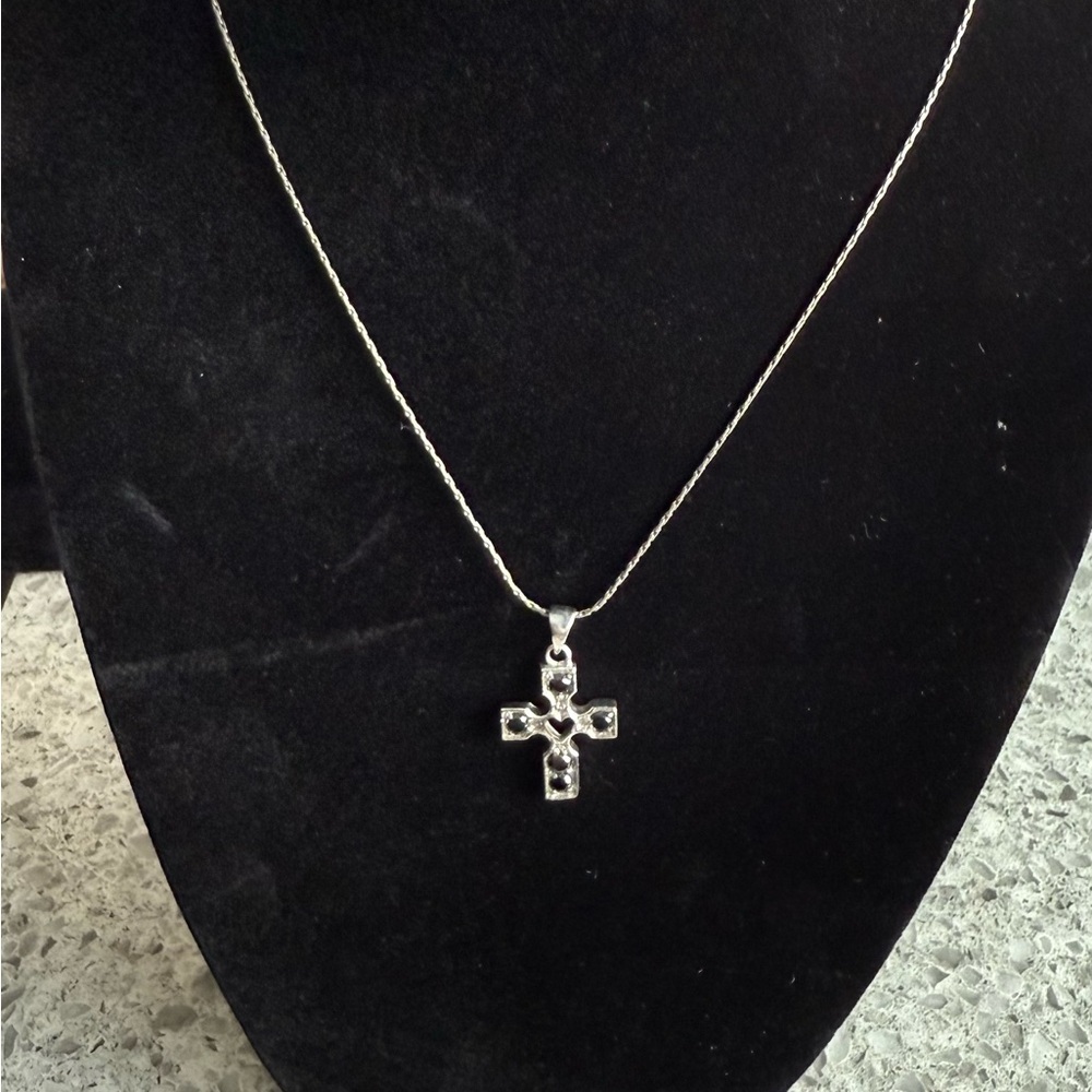 Elegant Silver Cross Pendant Necklace with Faceted Black Stones
